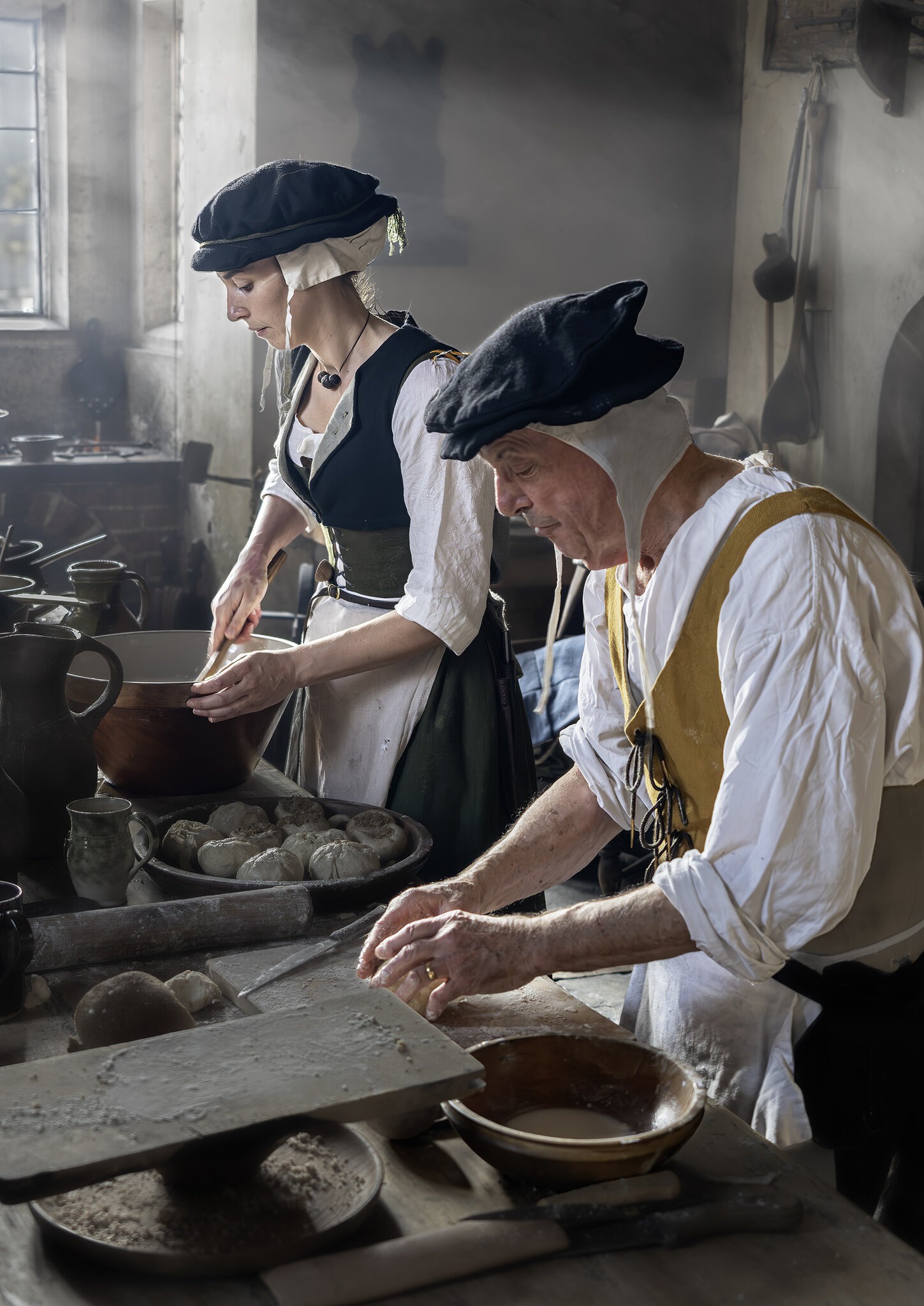 Food preparation in a medieval kitchen.jpg